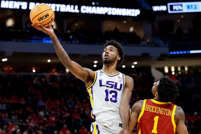 LSU Tigers forward Tari Eason (13) drives to the basket against Iowa State Cyclones guard Izaiah Brockington (1) in the first half during the first round of the 2022 NCAA Tournament at Fiserv Forum.